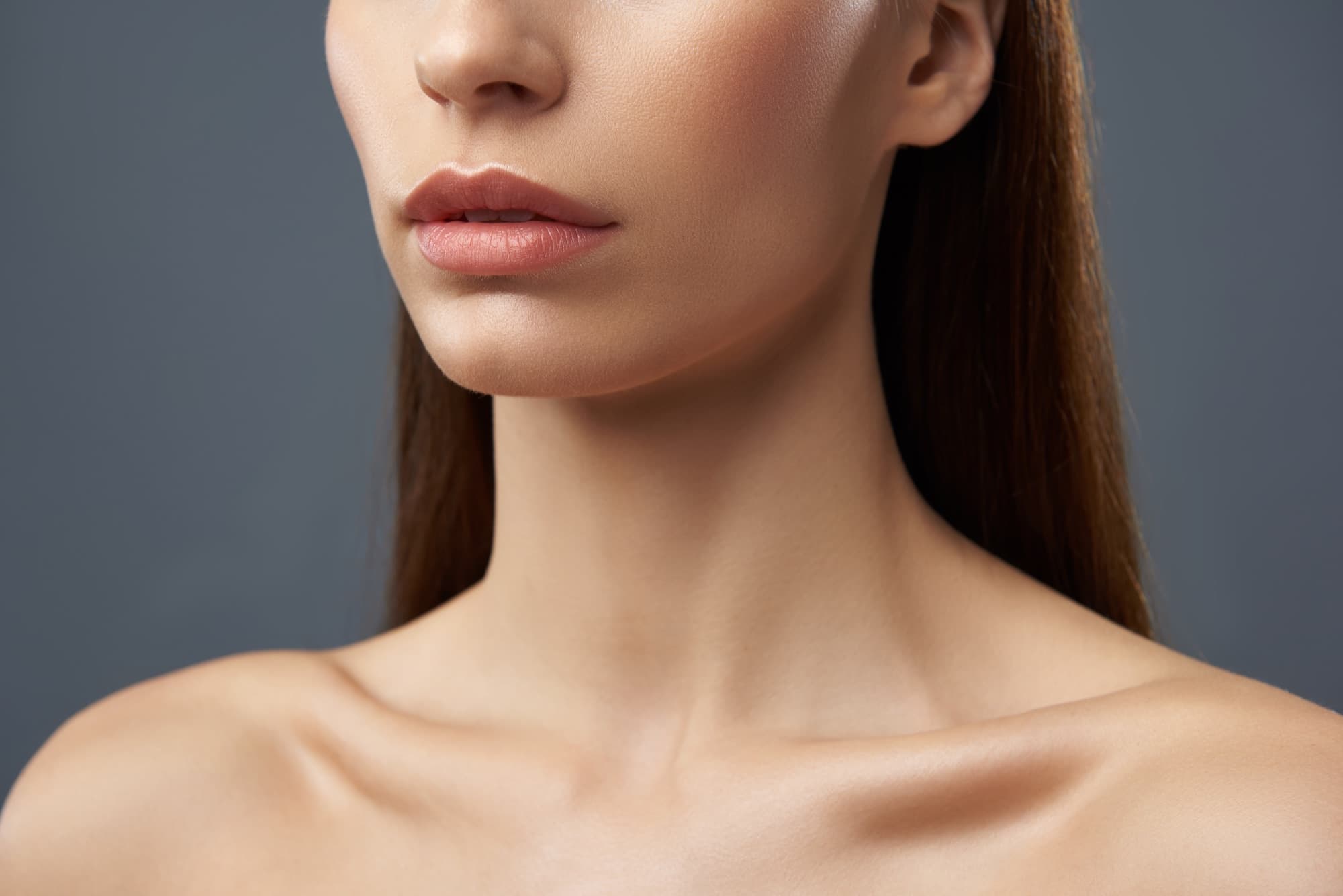 Close-up of a relaxed, defined jawline after masseter Botox at FusionMed Toronto